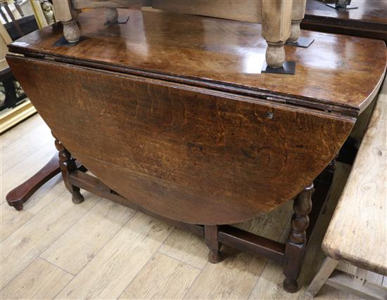 An 18th century oak gateleg table, W.120cm